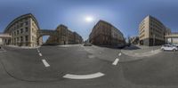 an image of a panoramic photograph of the street corner in front of the sun