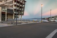 Cityscape at Dawn: Coastal Harbor and City Life