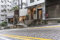 an outside building with a street and stairs between it, there is no image here