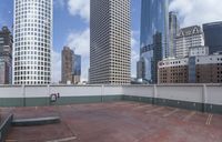 the large concrete deck has a parking lot that looks great in a city with tall buildings