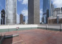 the large concrete deck has a parking lot that looks great in a city with tall buildings