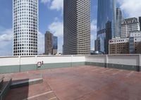 the large concrete deck has a parking lot that looks great in a city with tall buildings