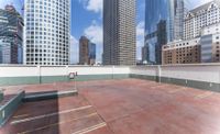 the large concrete deck has a parking lot that looks great in a city with tall buildings