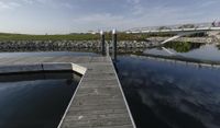 Cityscape of Milwaukee, Wisconsin with Coastal Boardwalk and River Reflections on a Clear Day