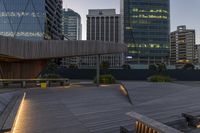 Cityscape at Night: Skyscrapers Illuminated by Lights