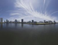 Cityscape of Tokyo: Clear Sky Over Coastal Bridge