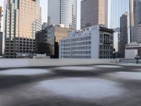 a view of the city through a roof deck overlooking the city's buildings on a clear day