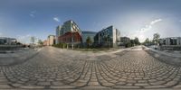 a fish eye lens shot of the front and side view of two buildings and walkways