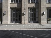 a parking space for traffic in front of a building with multiple windows and a parking space