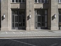 a parking space for traffic in front of a building with multiple windows and a parking space