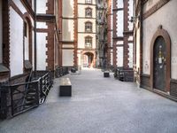 the view down the alley way into the building from the entrance to the courtyard area