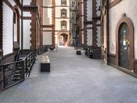 the view down the alley way into the building from the entrance to the courtyard area