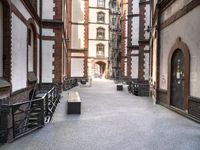 the view down the alley way into the building from the entrance to the courtyard area