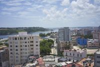 a large city with old buildings, some with red roofs and lots of other buildings