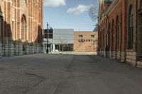 the street is empty except one car has to wait to enter it or leave it