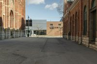 the street is empty except one car has to wait to enter it or leave it