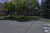 a street view of houses on the corner in the suburbs of washington, washington, and utah