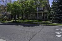 a street view of houses on the corner in the suburbs of washington, washington, and utah