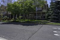 a street view of houses on the corner in the suburbs of washington, washington, and utah