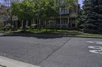 a street view of houses on the corner in the suburbs of washington, washington, and utah