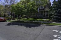 a street view of houses on the corner in the suburbs of washington, washington, and utah