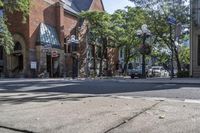 an old brick building with an awning on the outside, with no parking spaces on the sidewalk