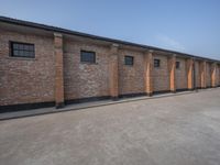 several brick building with windows next to each other on a sunny day in asia in the afternoon