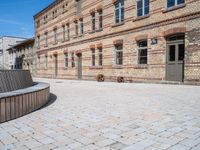 Berlin City Architecture: Classic Courtyard with Brick Walls and Clear Sky