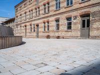 Berlin City Architecture: Classic Courtyard with Brick Walls and Clear Sky