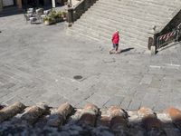 Classic Italian Plaza in Tuscany with Cobblestone Road