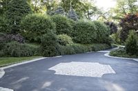 the driveway with the stone in it is clean and clean and also used as a driveway