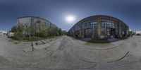 an upside down view of an industrial park in the middle of nowhere with a sun shining