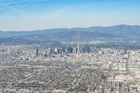 Aerial View of Los Angeles Cityscape with Modern Architecture and Clear Sky