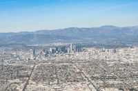 Aerial View of Los Angeles Cityscape with Modern Architecture and Clear Sky