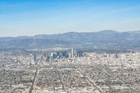 Aerial View of Los Angeles Cityscape with Modern Architecture and Clear Sky