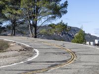 Clear Sky and Asphalt Road with Low Grass