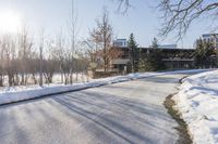 Clear Sky and Asphalt Road in a Residential Area