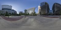 a view of a park from a circular skateboard park in downtown los, california