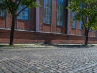 Clear Sky Over Berlin's Cobblestone Roads