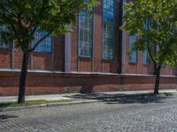 Clear Sky Over Berlin's Cobblestone Roads