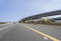 Clear Sky: Bridge on the Highway with Motion Blur