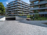 a large brick pavers are arranged into a building courtyard and in a city plaza