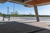 empty parking lot with sky in the background in an urban city area of an airport