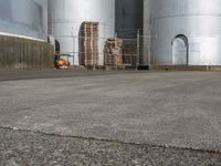 Clear Sky over Concrete Factory with Vegetation