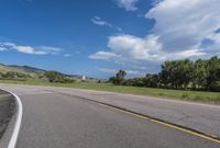 Clear Sky Curve on Asphalt Road