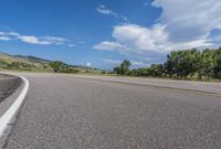 Clear Sky Curve on Asphalt Road
