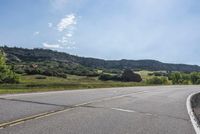 Clear Sky Curve on Asphalt Road