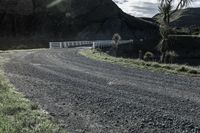 Clear Sky Day: Crossing a Bridge on a Dirt Road