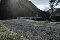 Clear Sky Day: Crossing a Bridge on a Dirt Road