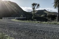 Clear Sky Day: Crossing a Bridge on a Dirt Road